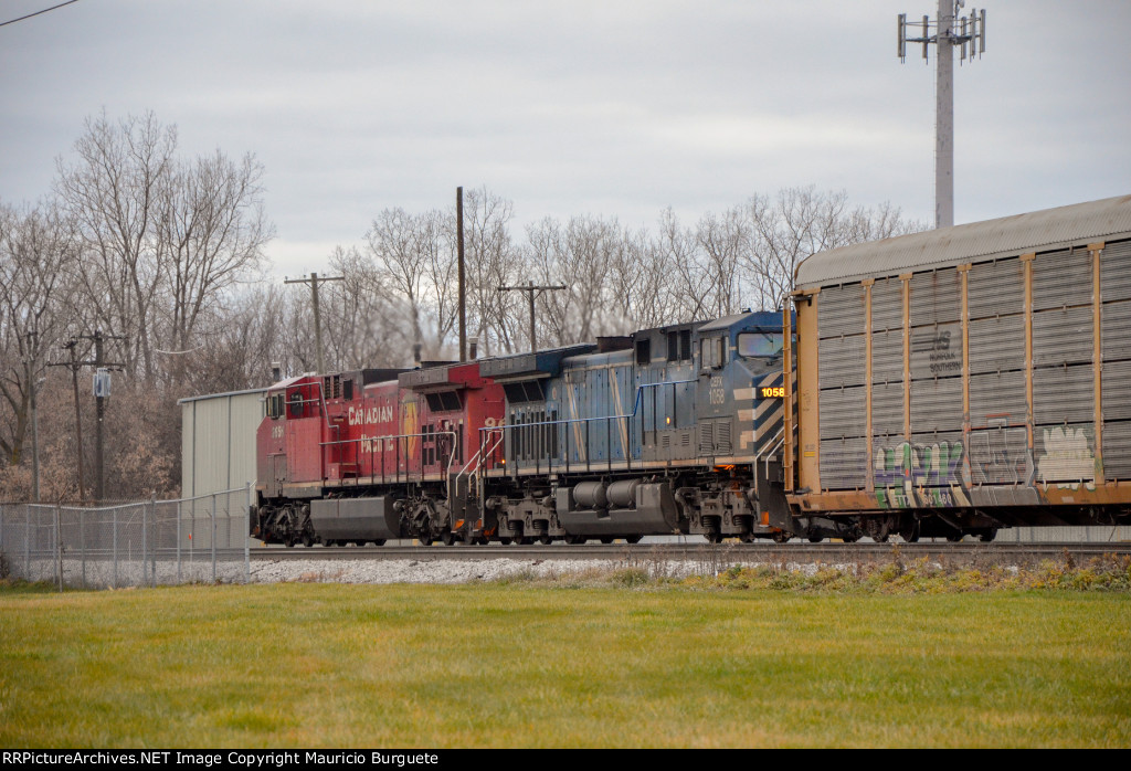 CP + CEFX AC44CW Locomotives leading a train